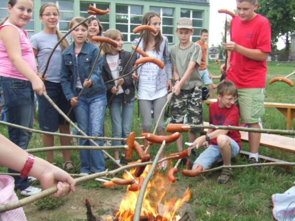Host village bonding - roasting kielbasa!