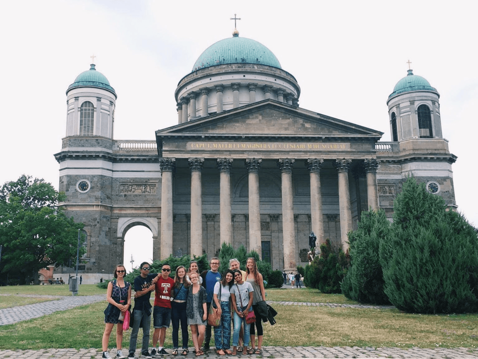Hungary Slovakia Picture Mid Point Break Volunteers in front of a large building with columns